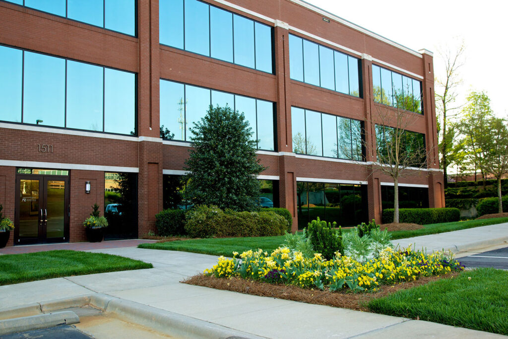 Small landscaping project at office building entrance.